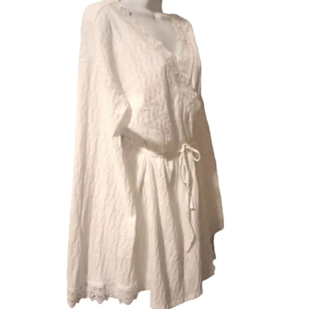 Asos textured long sleeve white miniโwrapโdressโwithโcrochetโtrimโsizeโ10